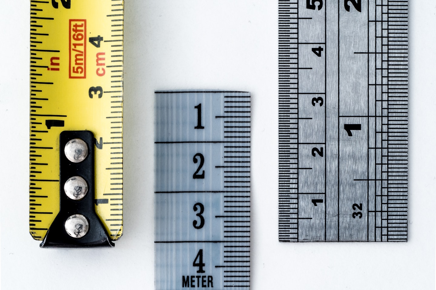 Macro of various tape measures and rulers, created for a weekly challenge on the Flickr Macro Mondays group